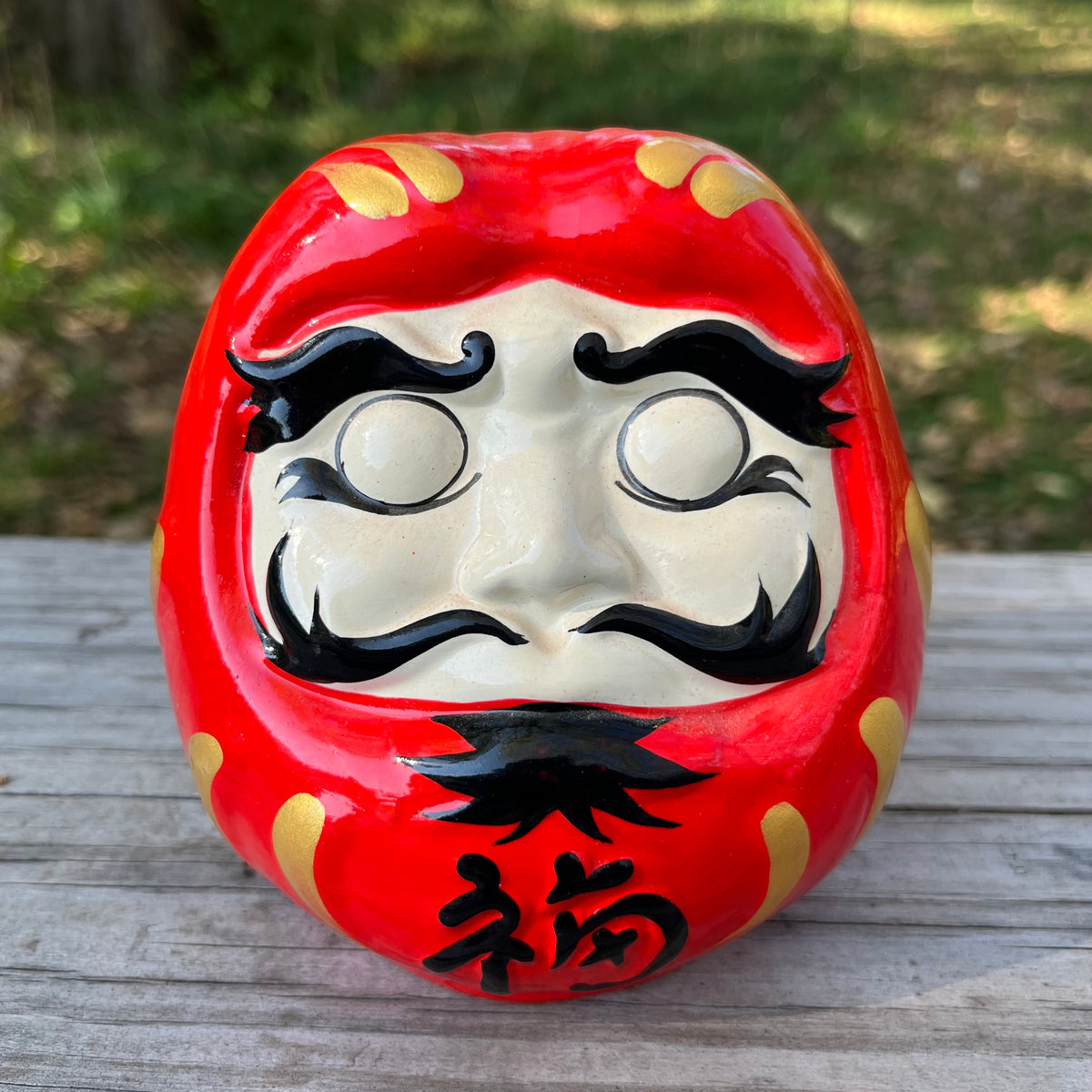 Vintage ceramic Daruma doll.