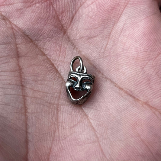Vintage Sterling silver drama mask charm.