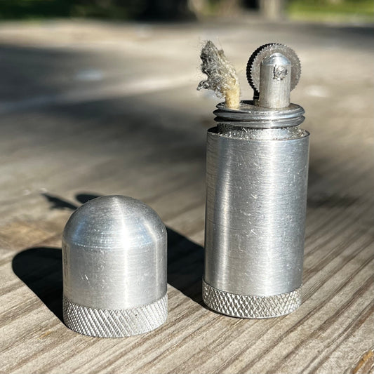Vintage lipstick lighter.