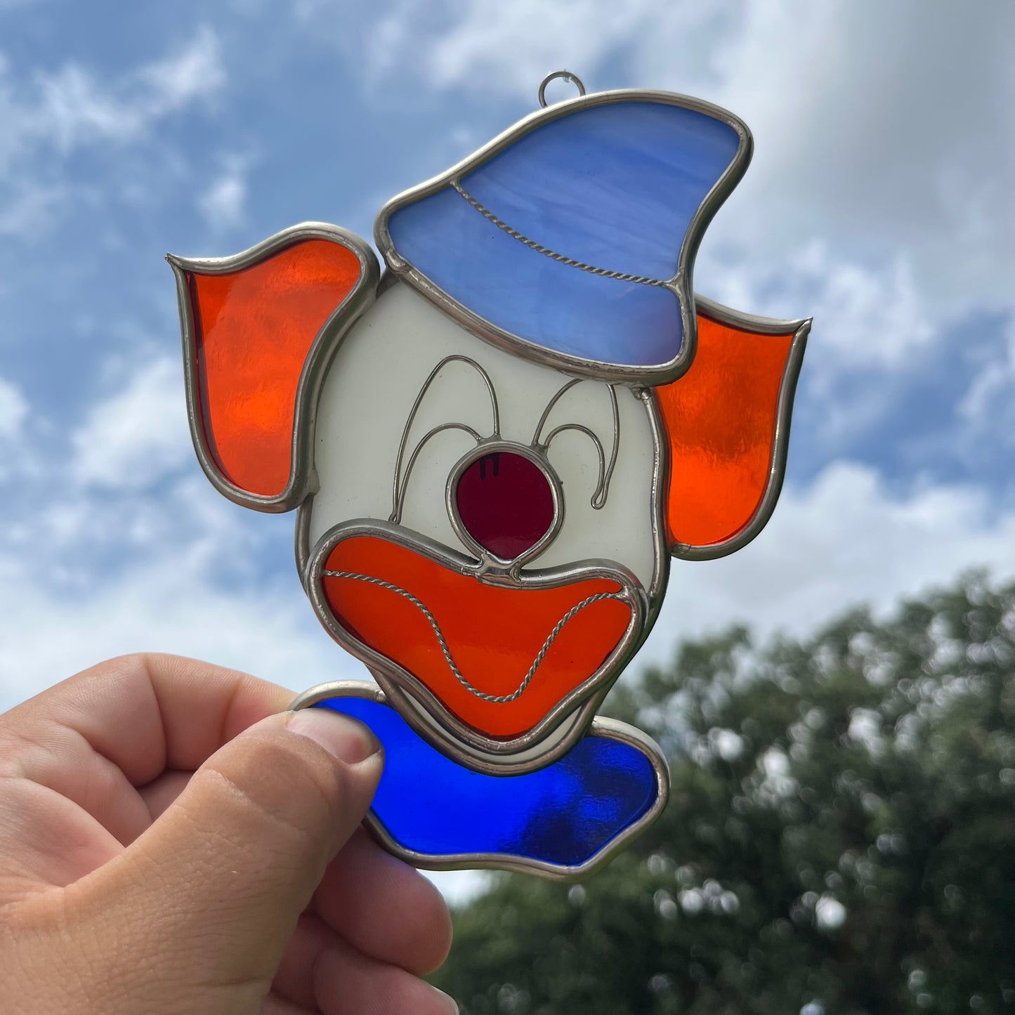Vintage stained glass clown.