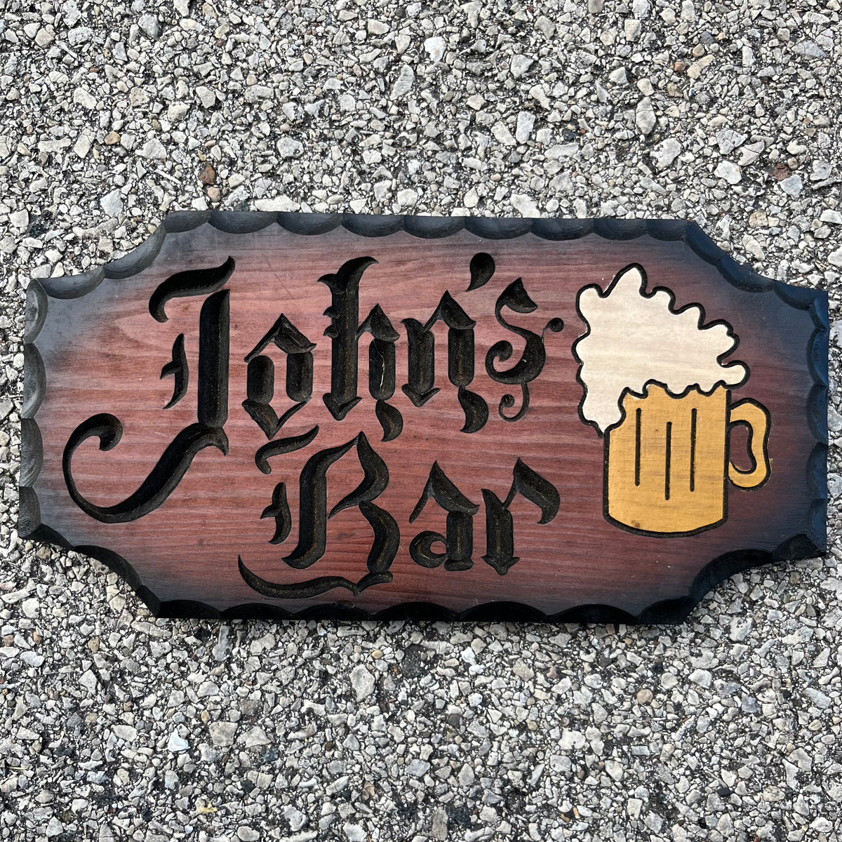 Vintage wood cut “John’s Bar” plaque.