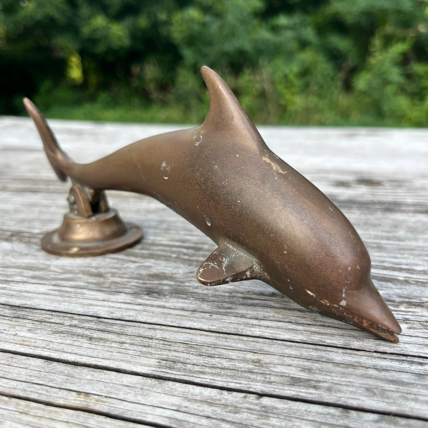 Vintage brass dolphin door knocker.