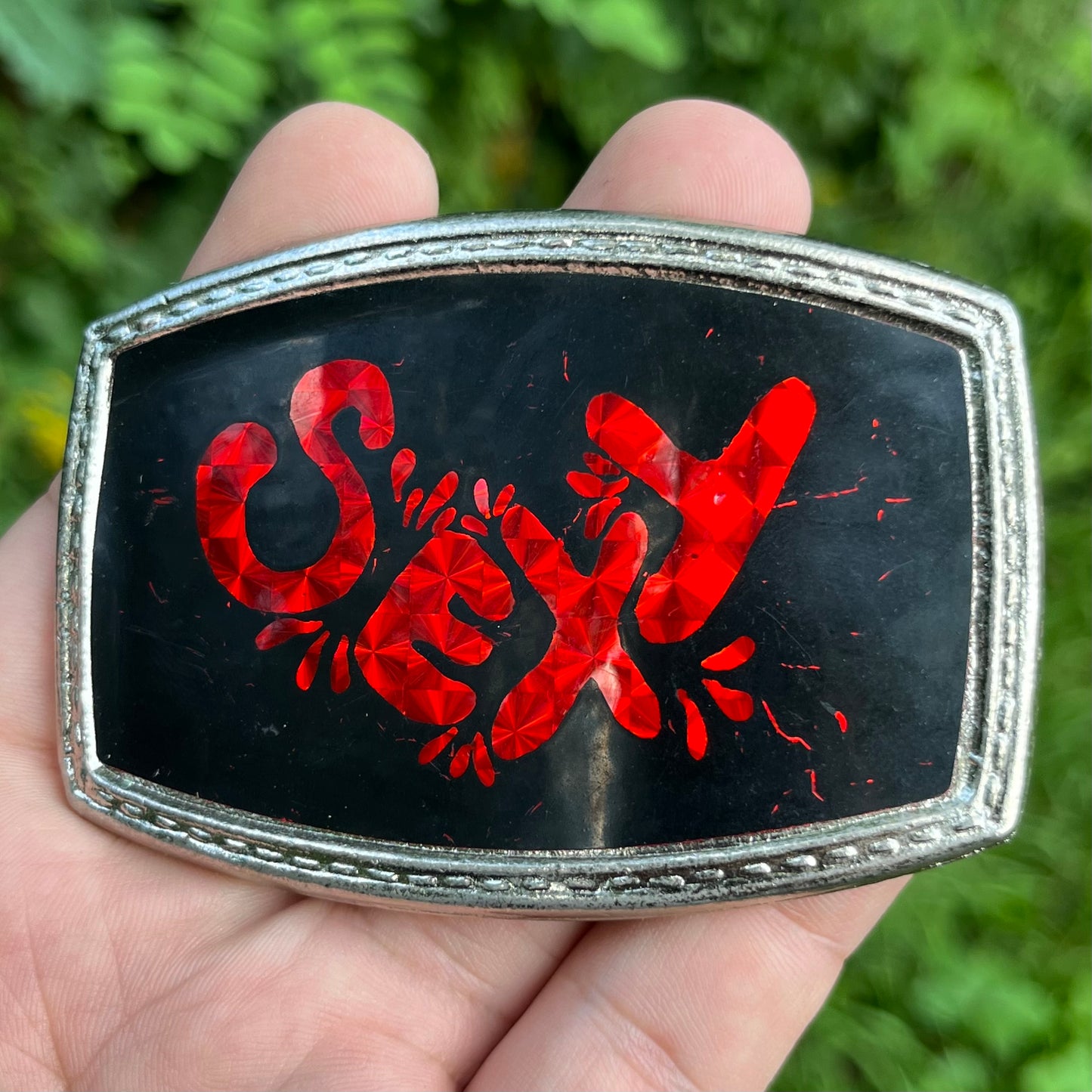 Y2K “Sexy” belt buckle.