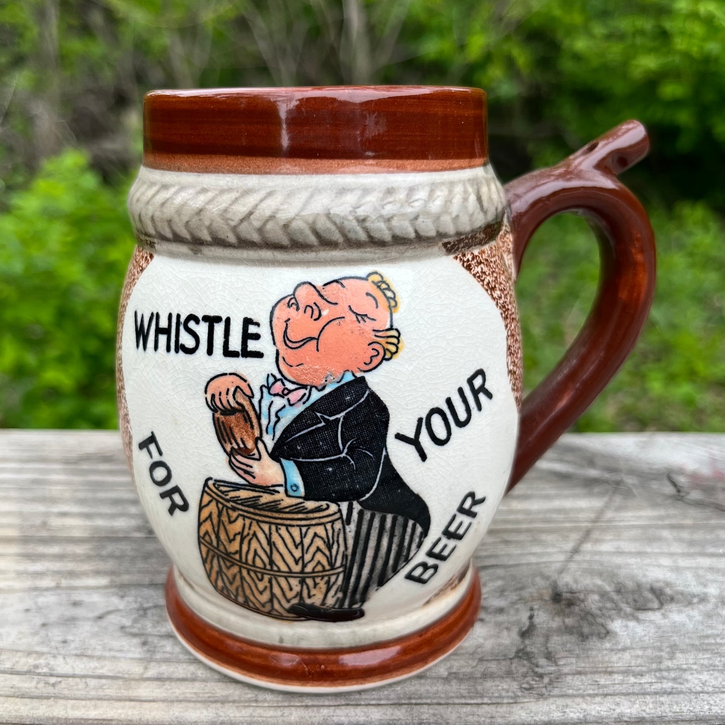 1950s “Whistle for your beer” mug.