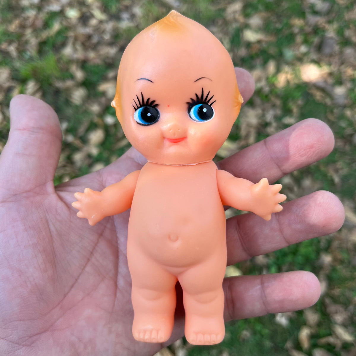 Vintage vinyl Kewpie.