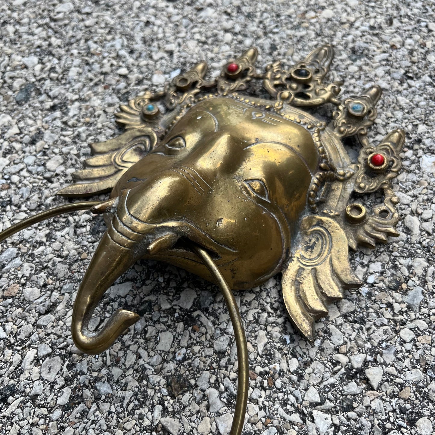 Vintage brass Ganesh cloth holder.