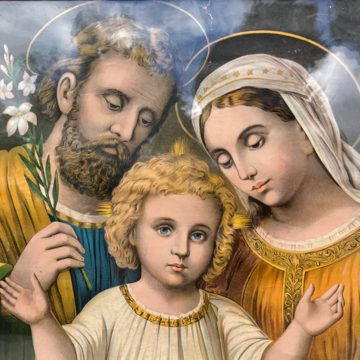 1950s “Holy Family” lithograph in original frame. (Some water damage)