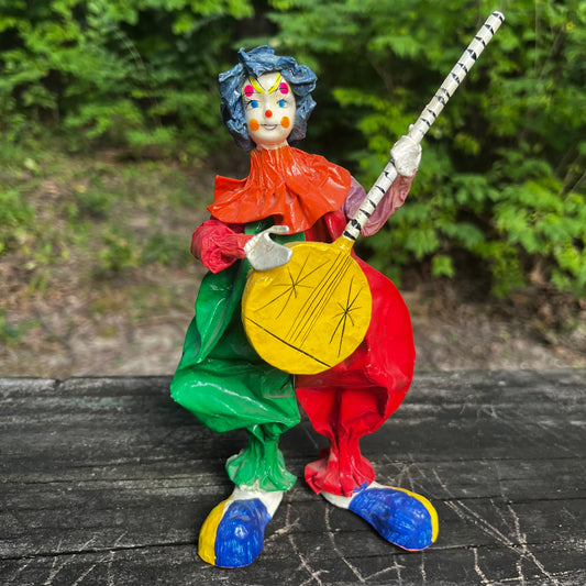 Vintage paper mache clown.