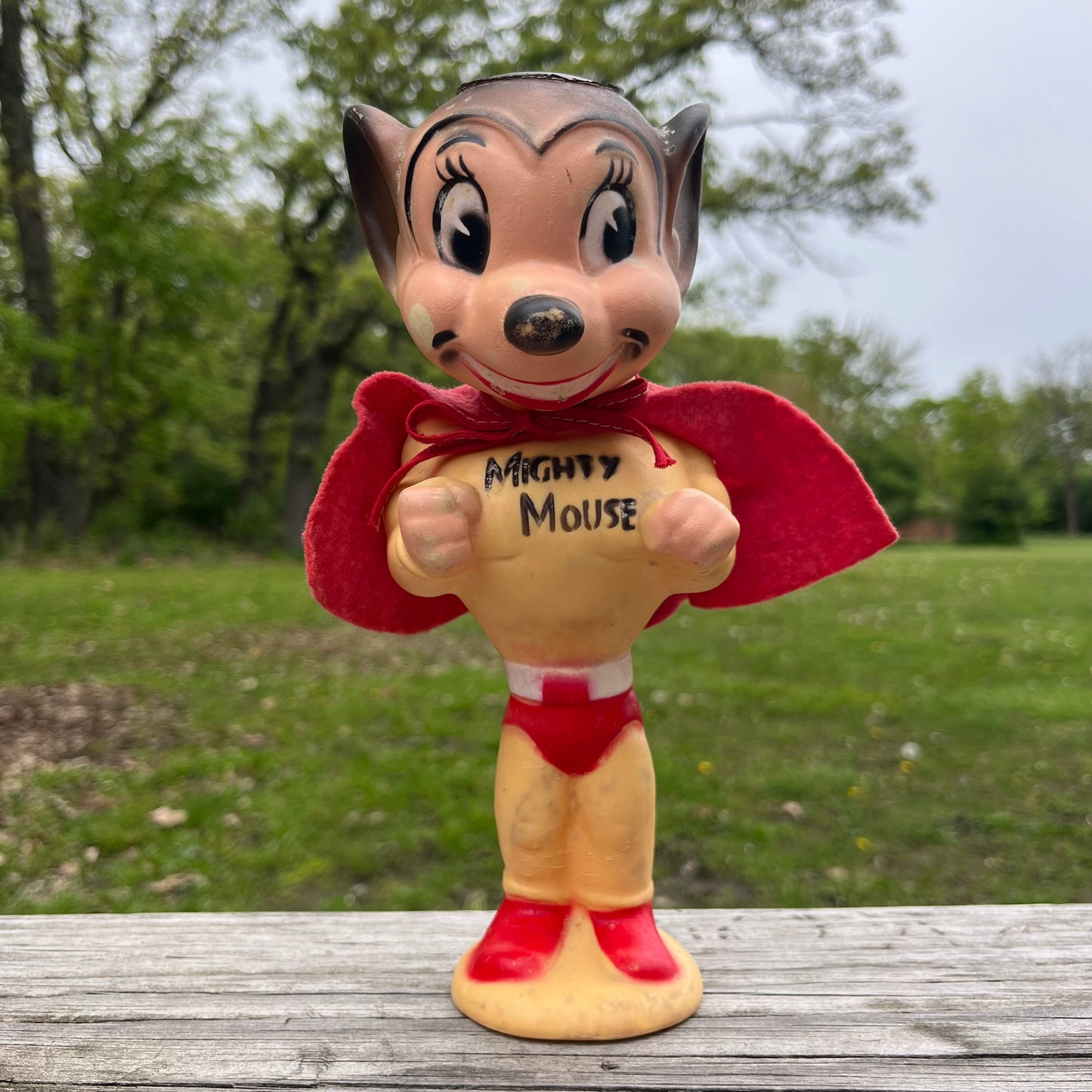 Vintage vinyl Mighty Mouse squeaker toy.