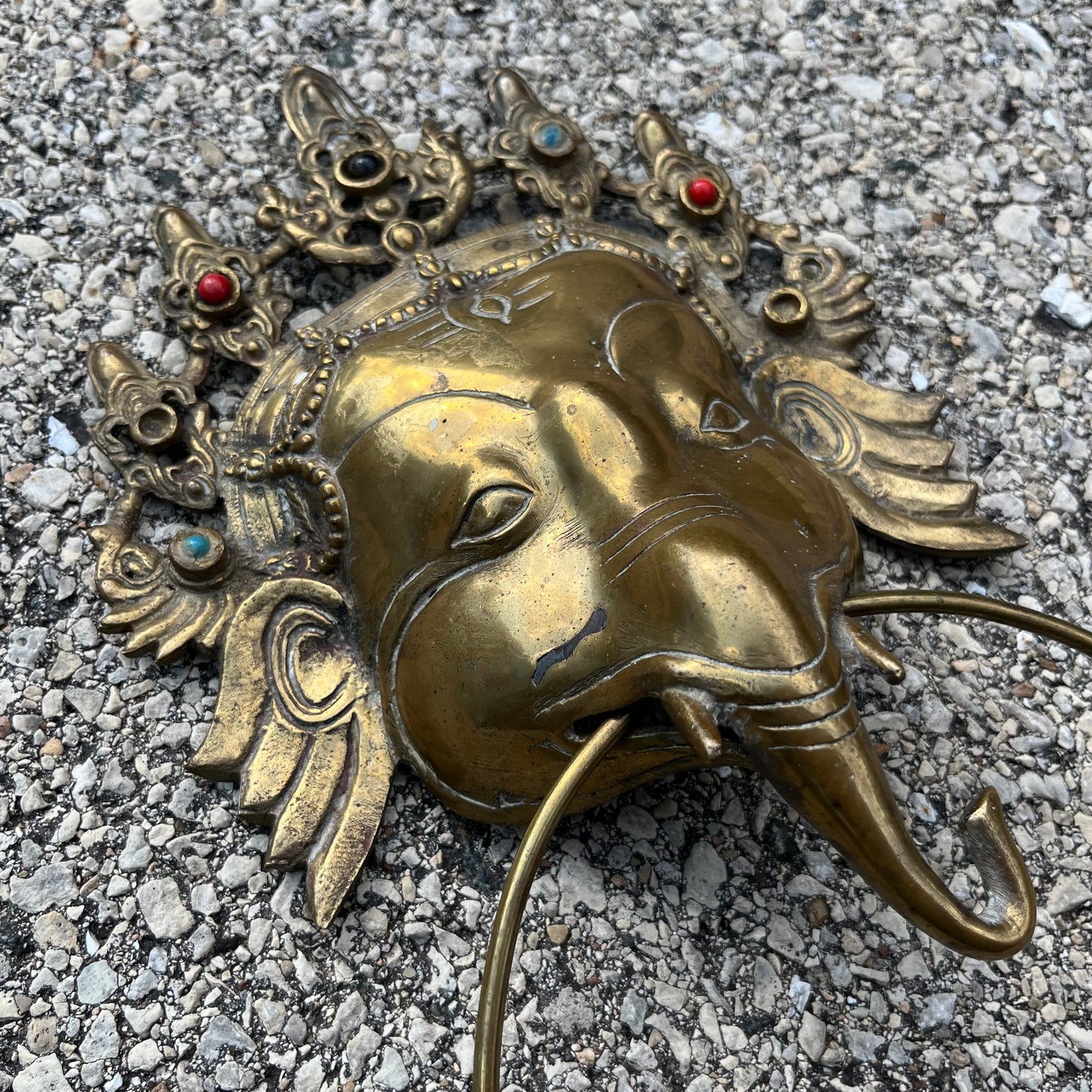 Vintage brass Ganesh cloth holder.