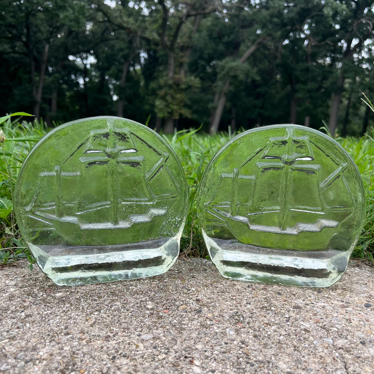 Vintage nautical ship clear glass bookends.