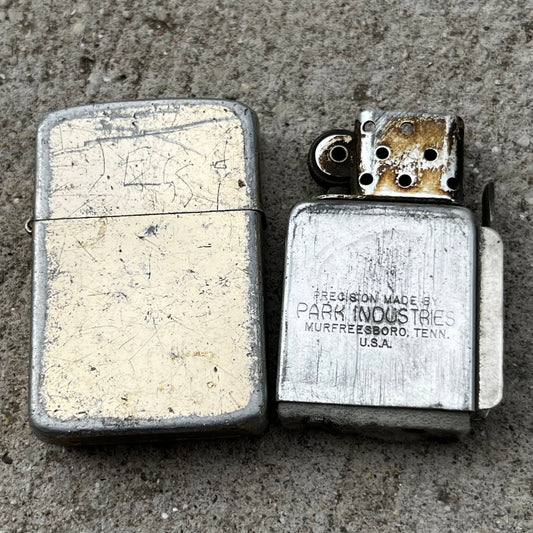Vintage Park Sherman flip lighter.