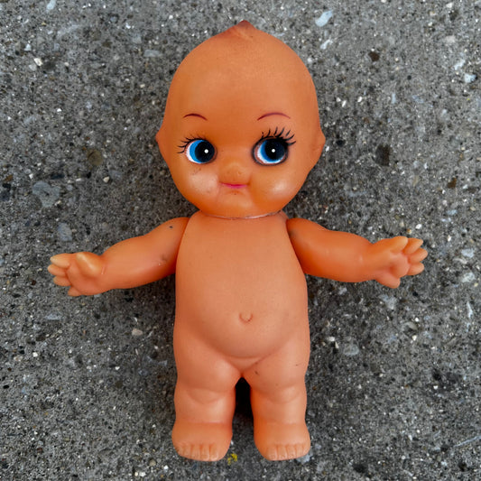 Vintage vinyl Kewpie doll.