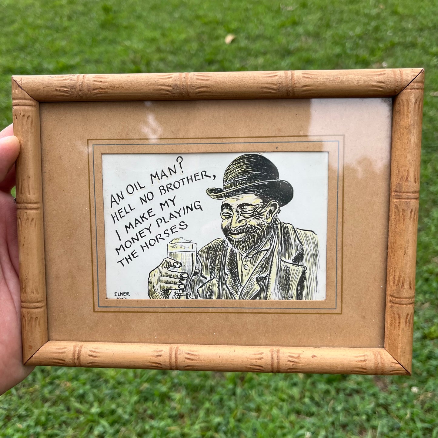 Vintage framed comic cut out.