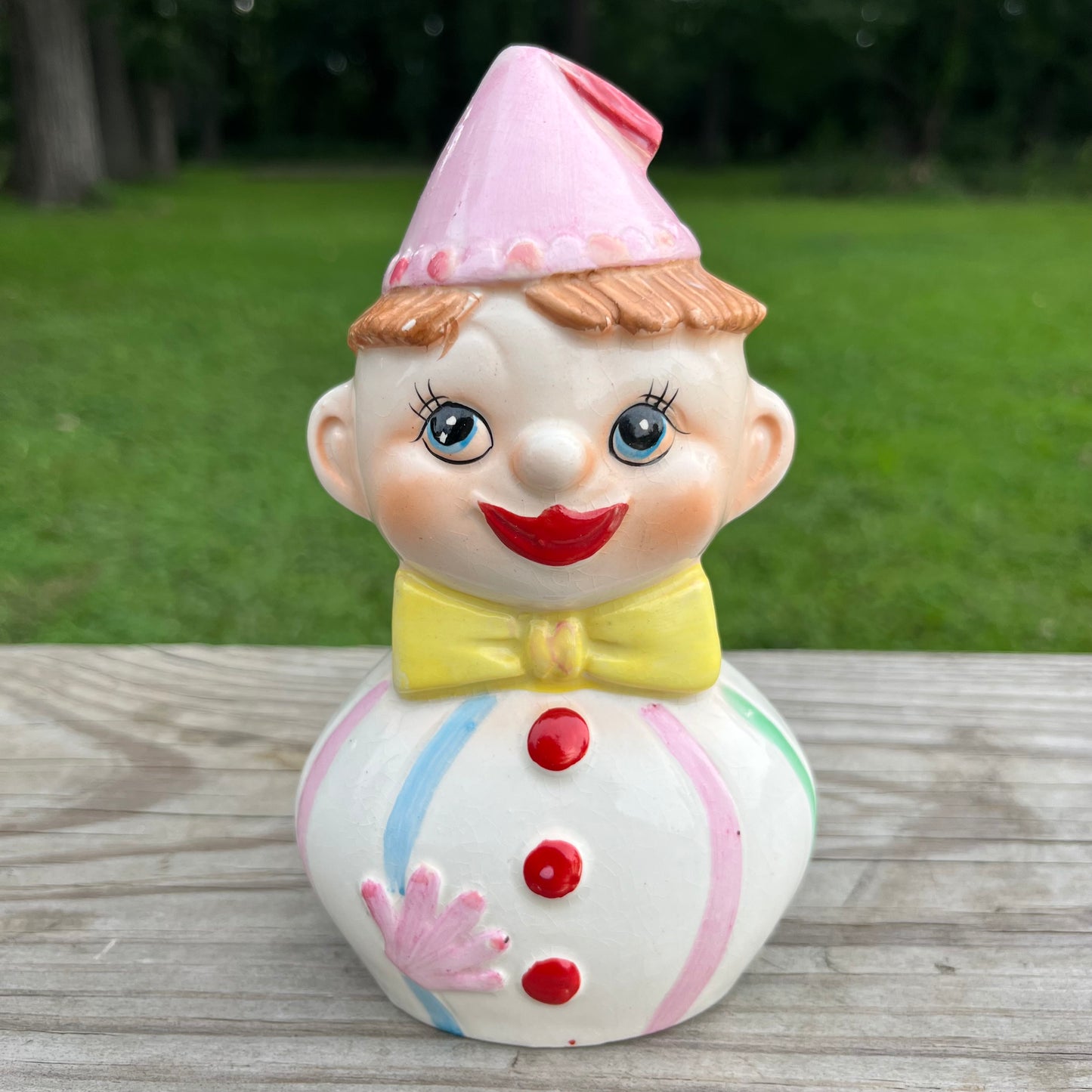 Vintage ceramic clown coin bank.