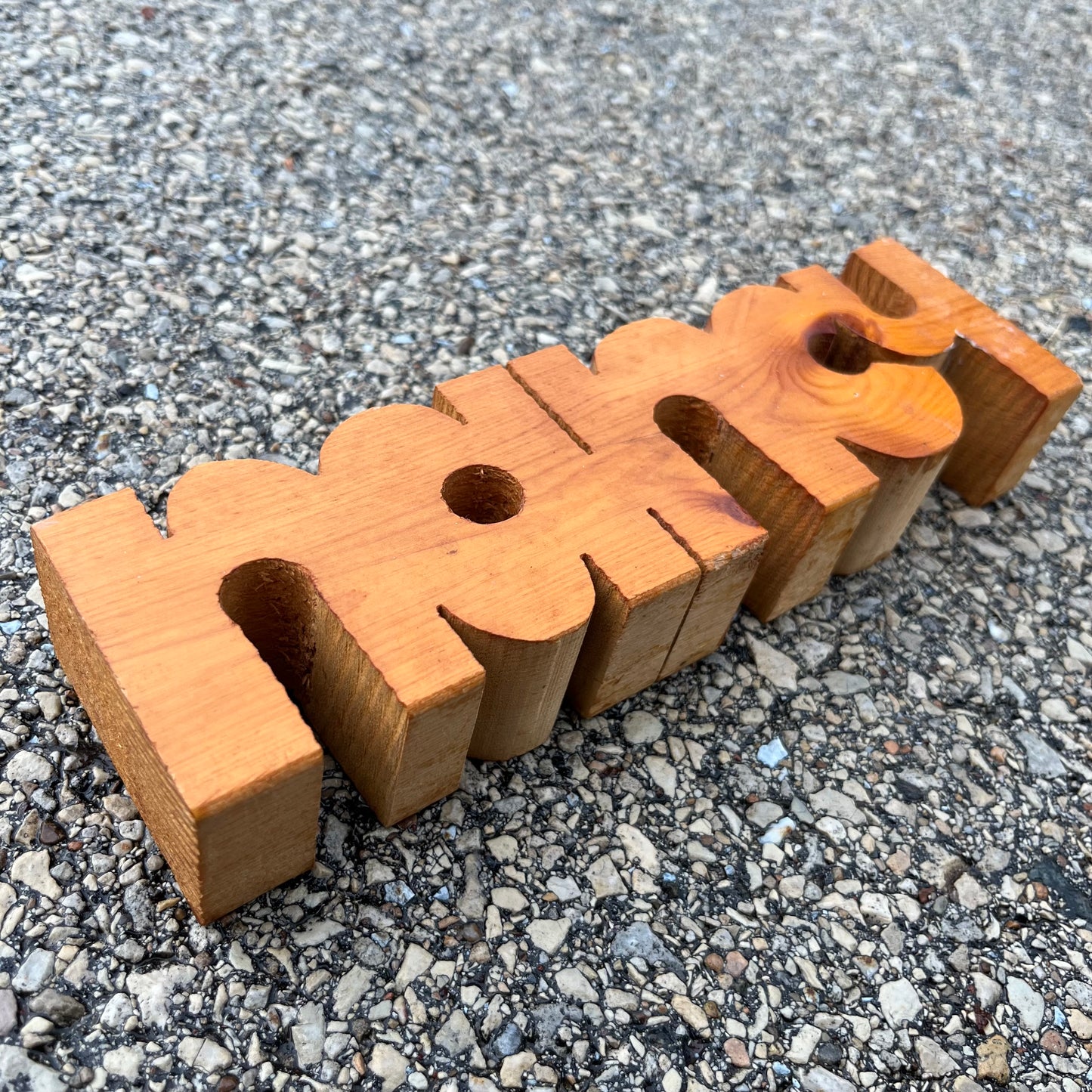 90s “Nancy” wood carving.