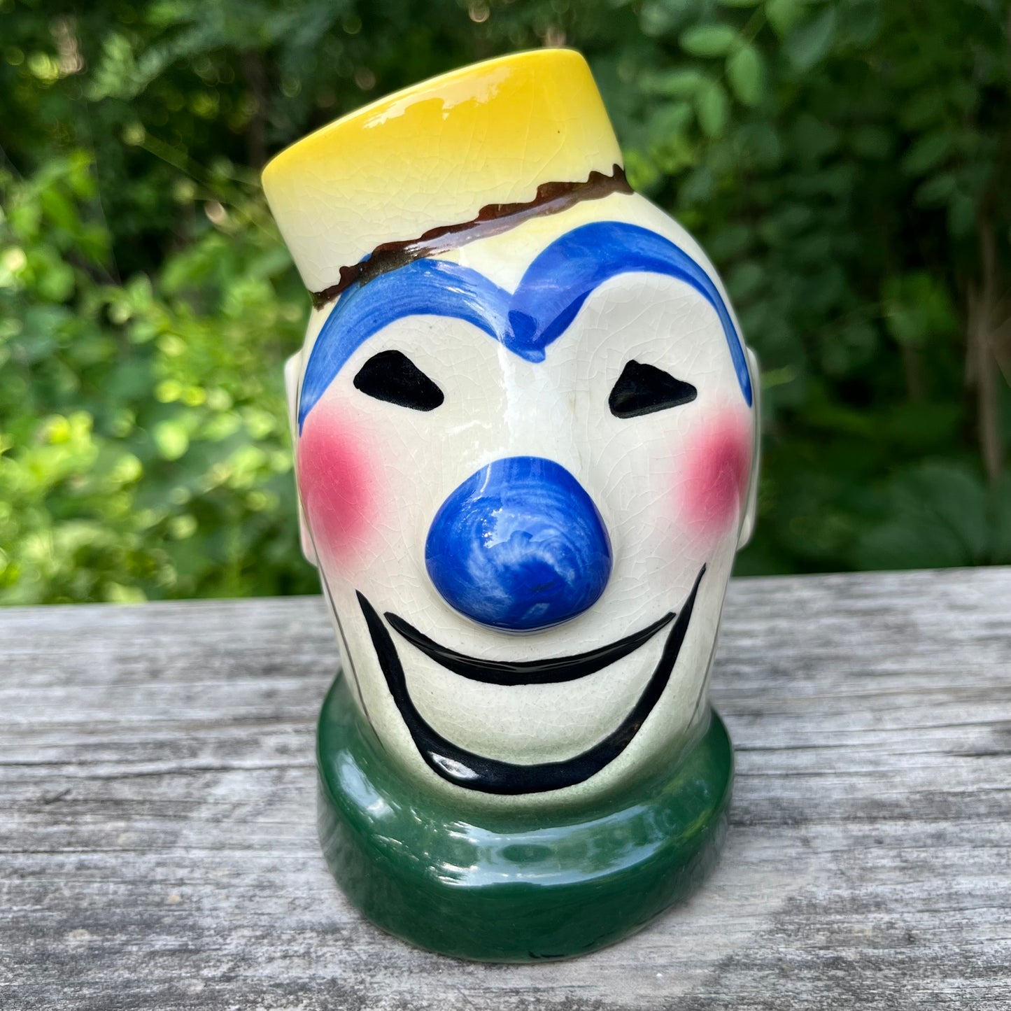 Vintage ceramic bellhop clown coin bank.