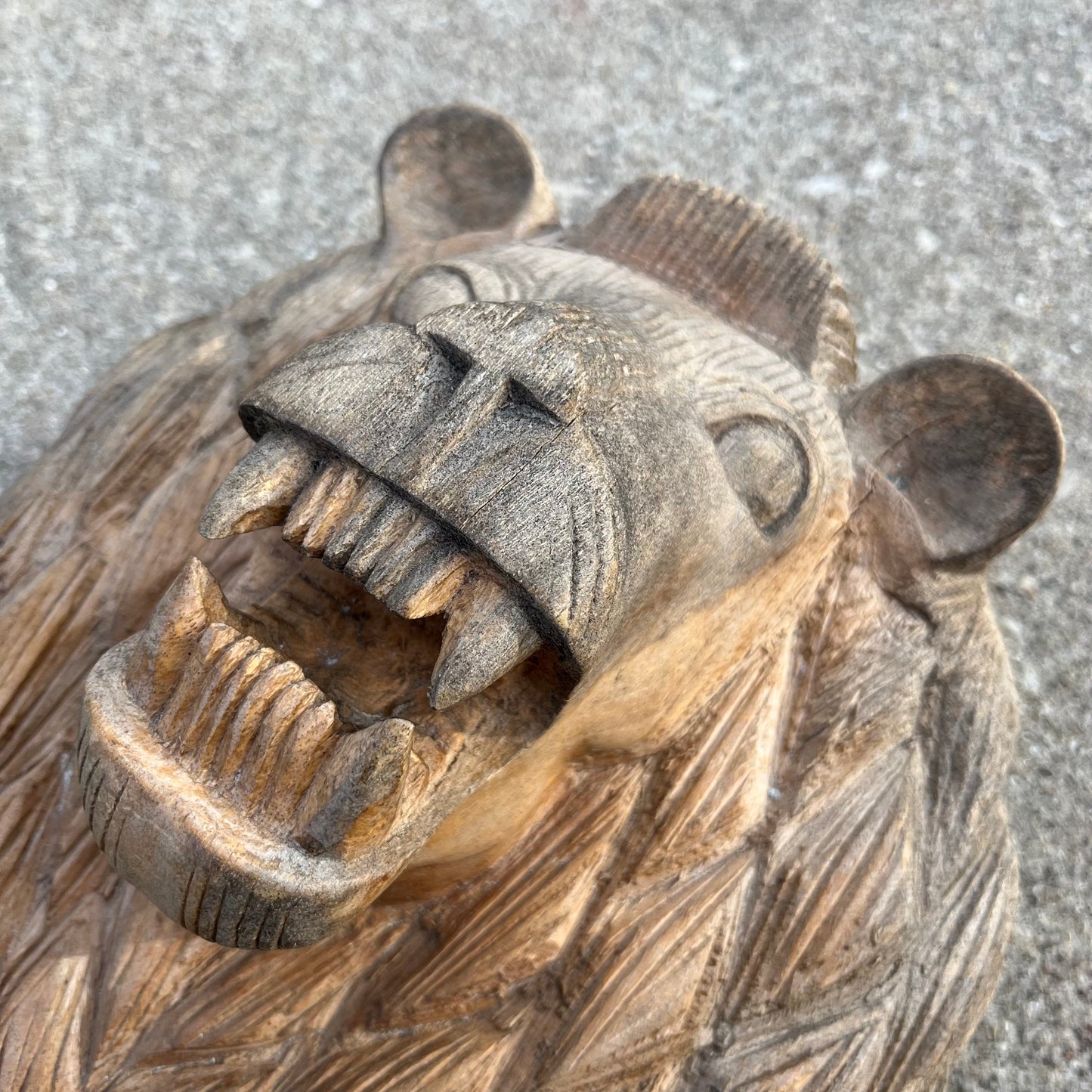 Vintage hand carved wooden growling lion.