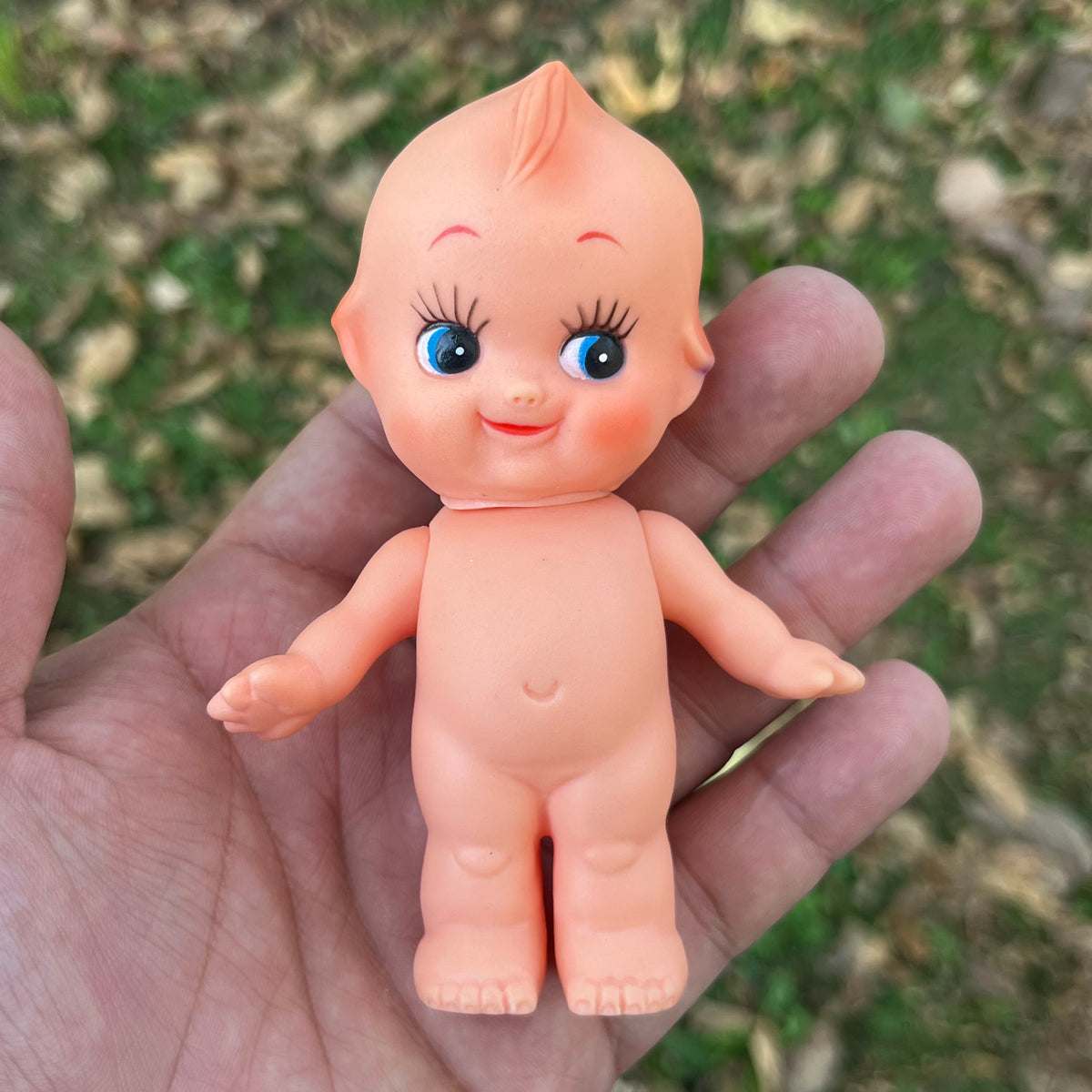Vintage vinyl Kewpie.