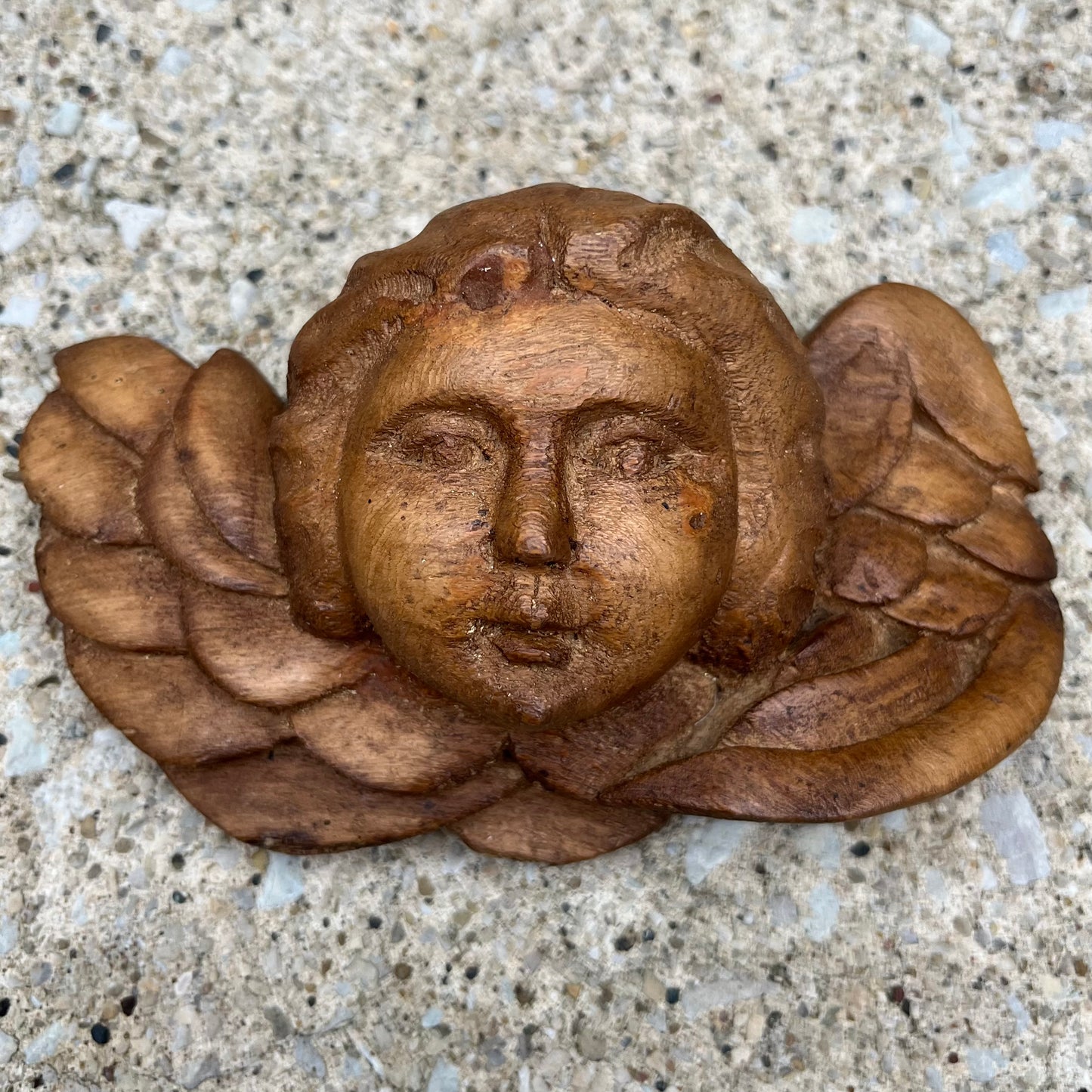 Vintage hand carved cherub.