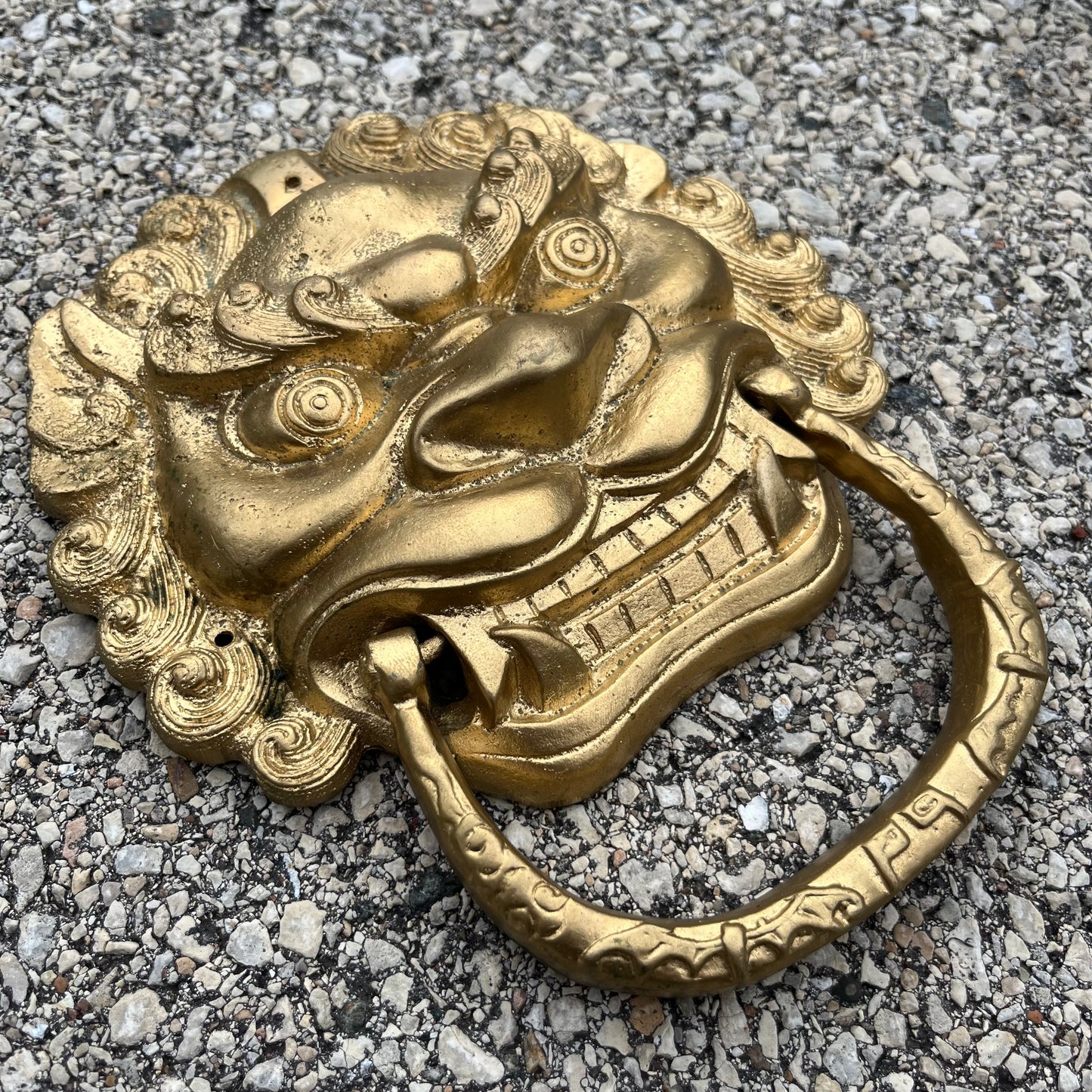 Vintage metal Foo dog door knocker.