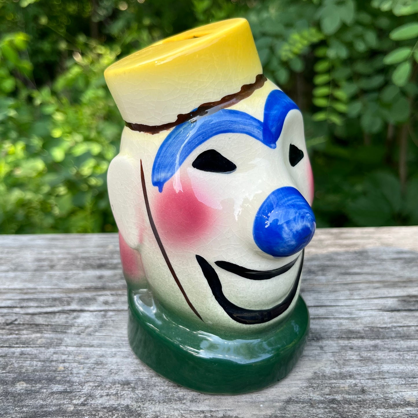 Vintage ceramic bellhop clown coin bank.