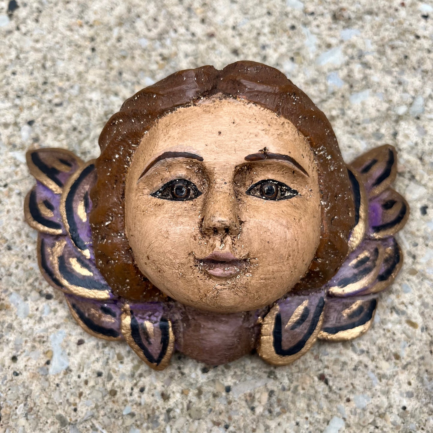 Vintage hand carved cherub.