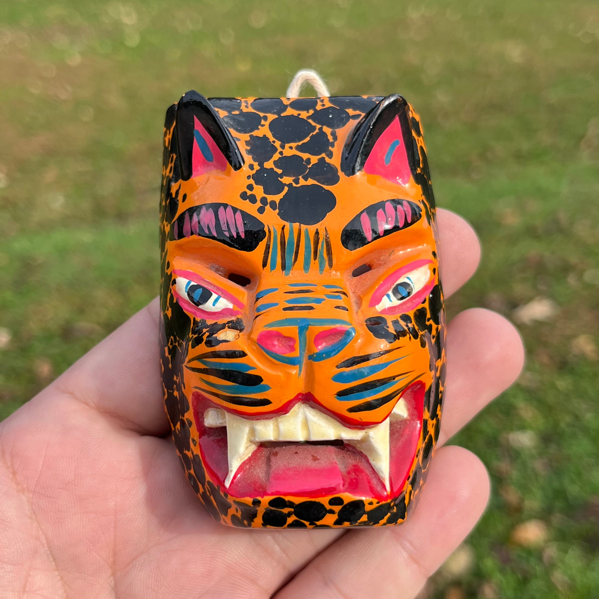 Mini hand crafted Jaguar mask.