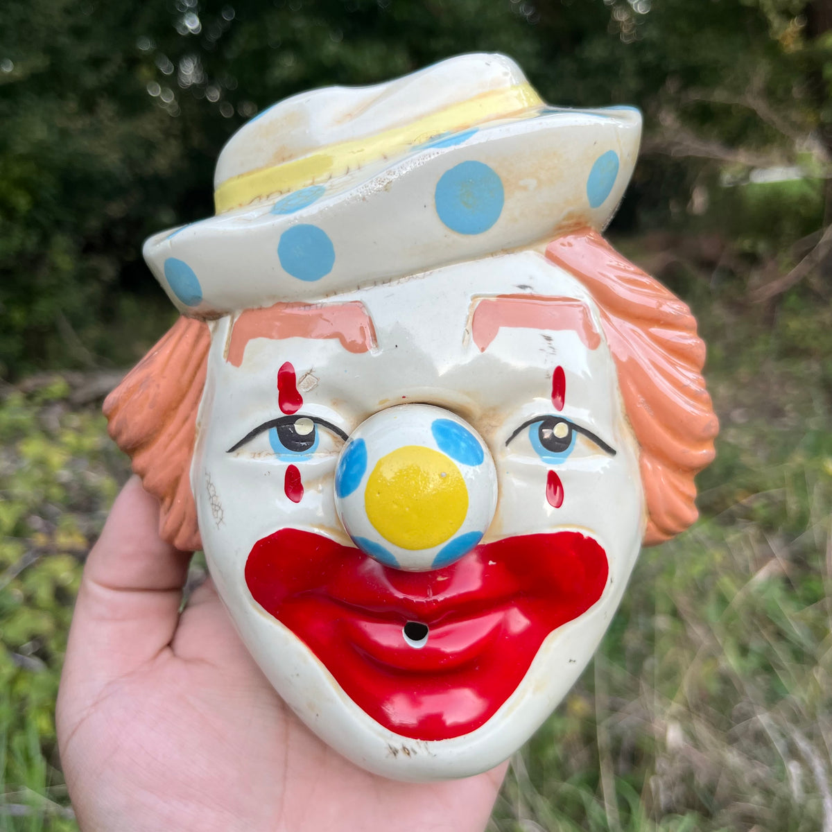 1950s Clown head string holder.