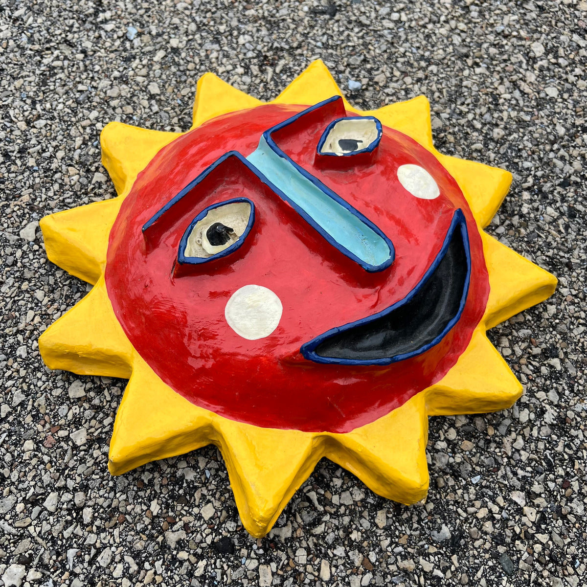 Vintage paper mache sun mask.