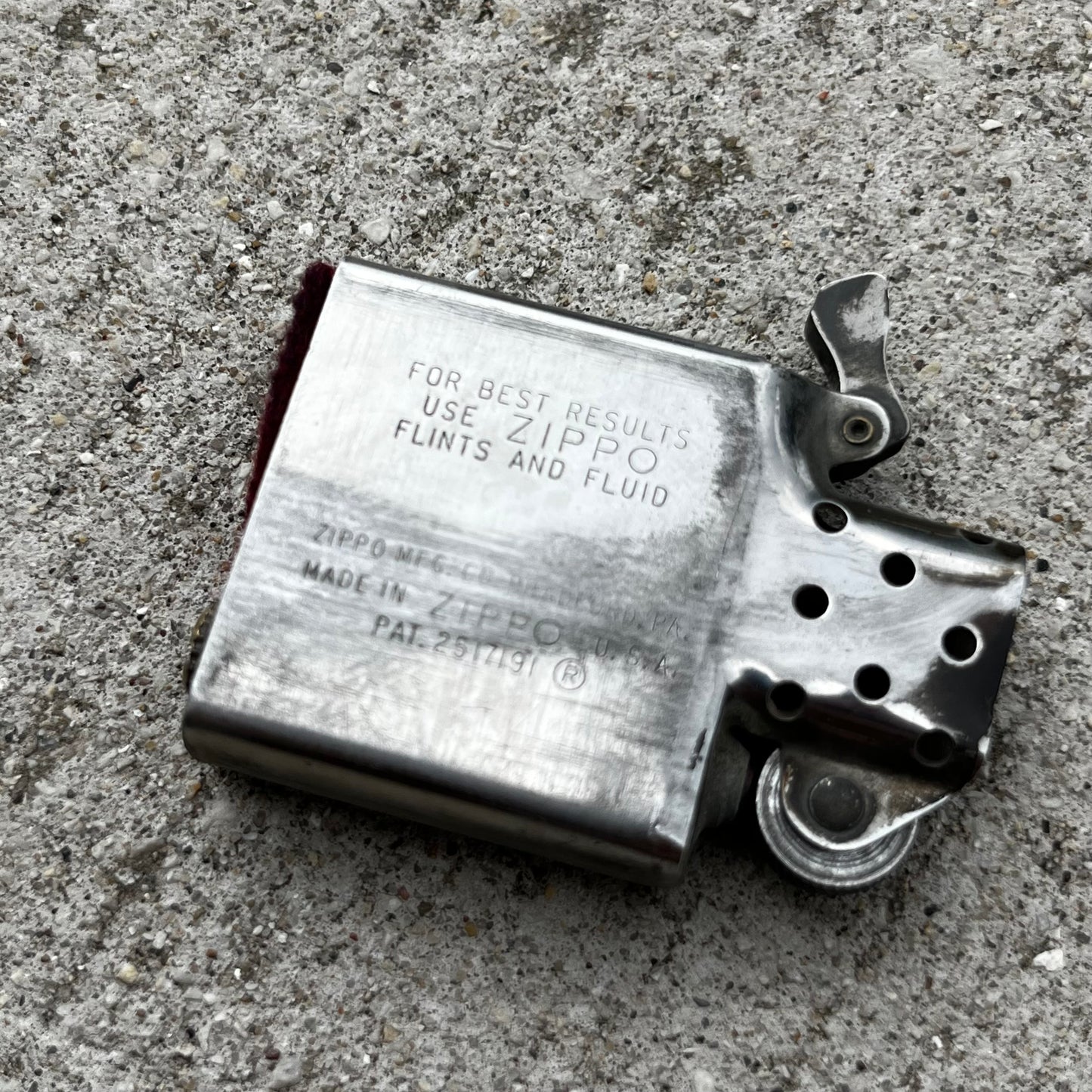 1960s Zippo flip lighter.