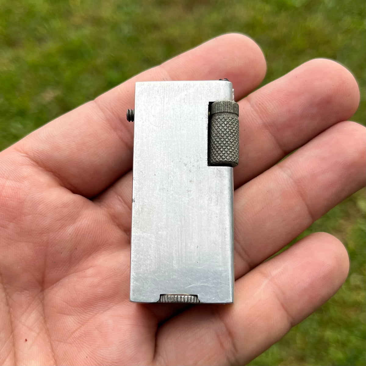 1940s Wyndham aluminum block lighter.