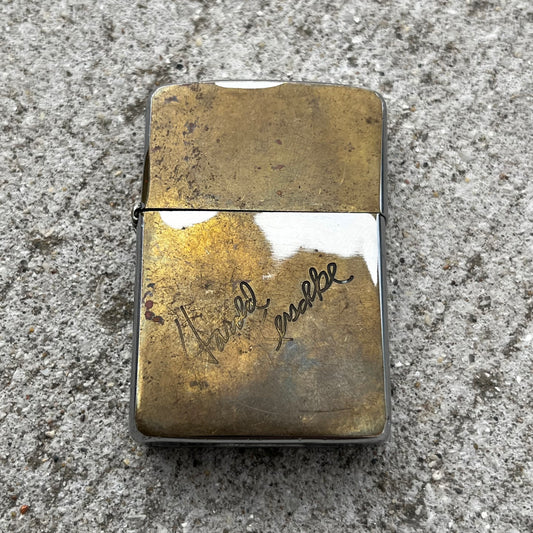 1960s Zippo flip lighter.