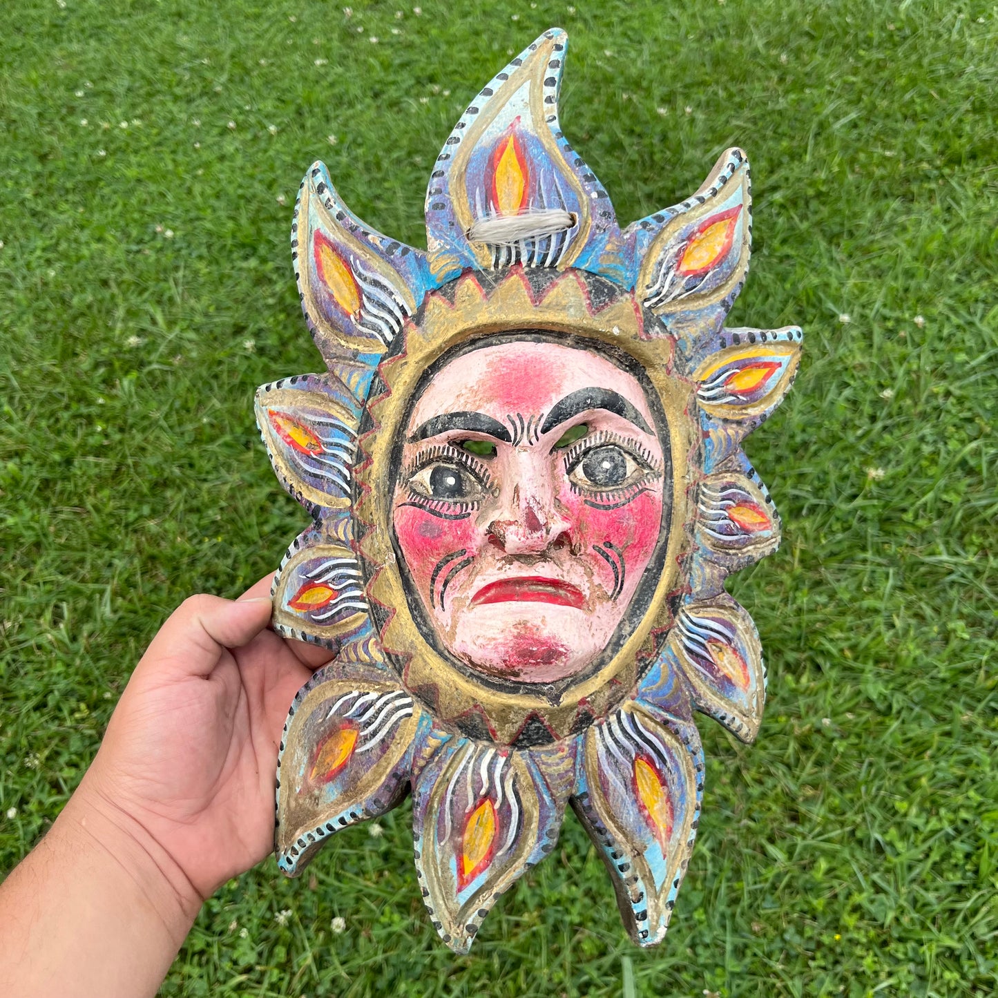 Vintage hand crafted sun mask.