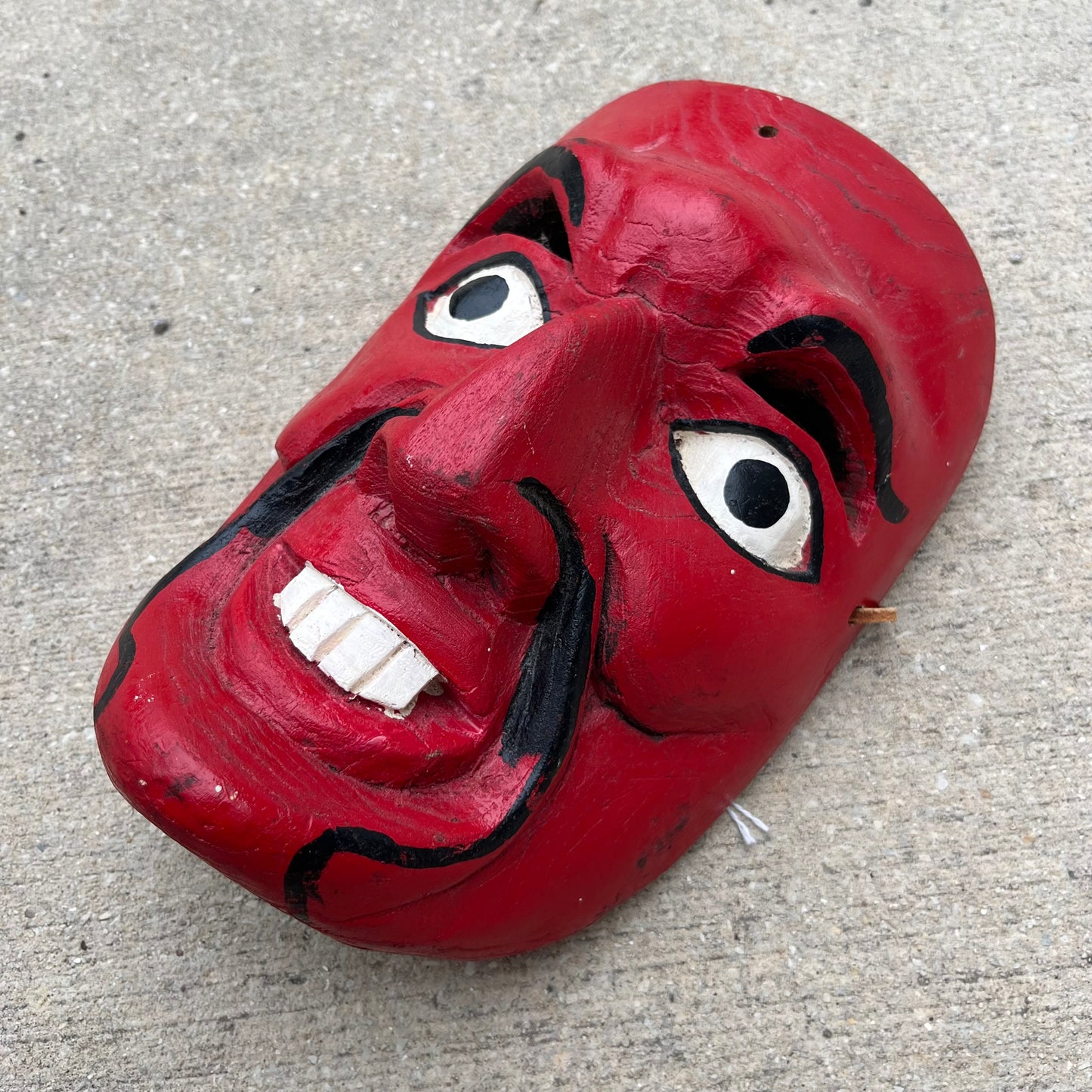 Vintage red demon mask.