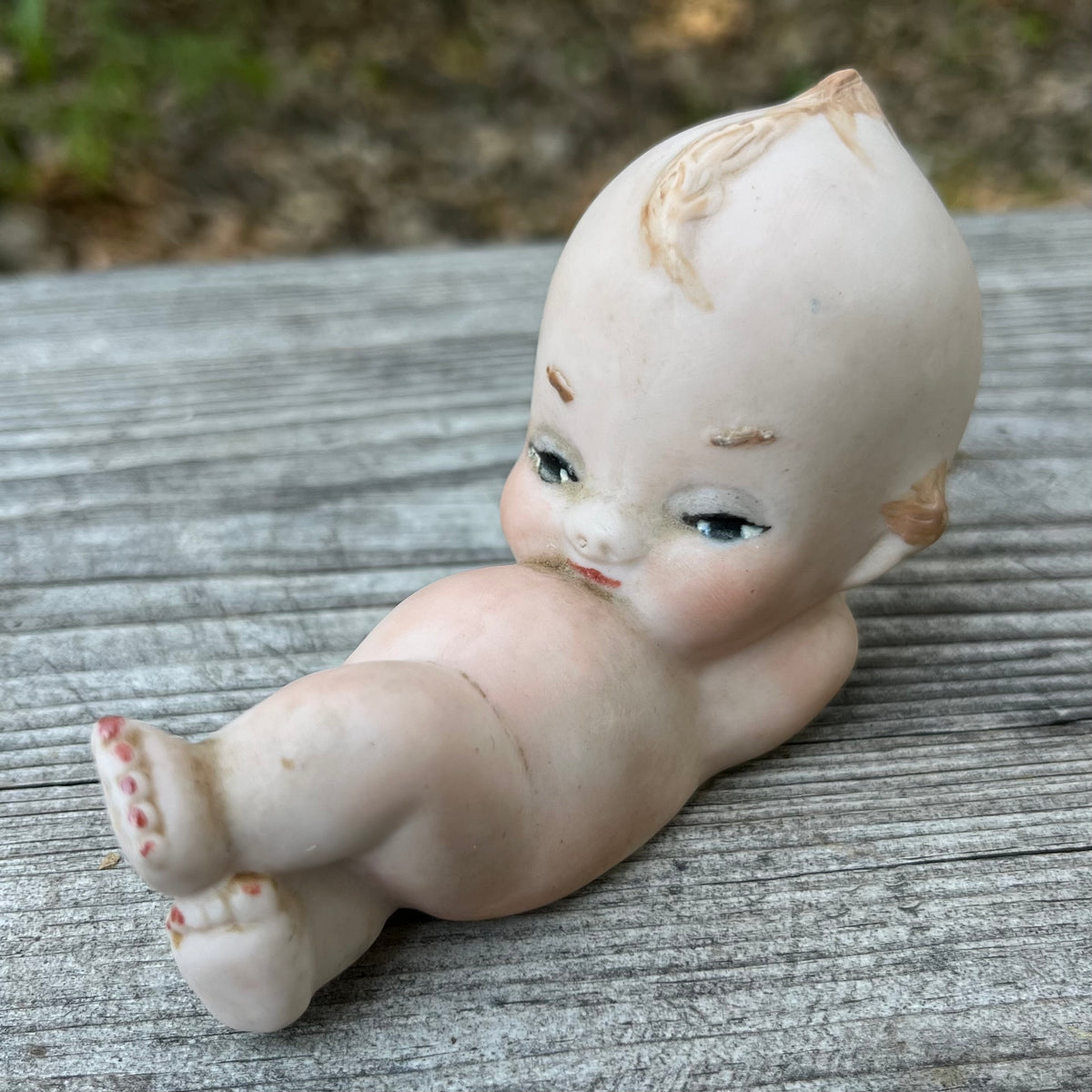Vintage sleepy Kewpie.