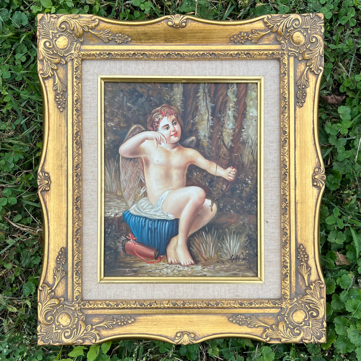 Vintage original Cupid/Cherub oil painting in ornate frame.