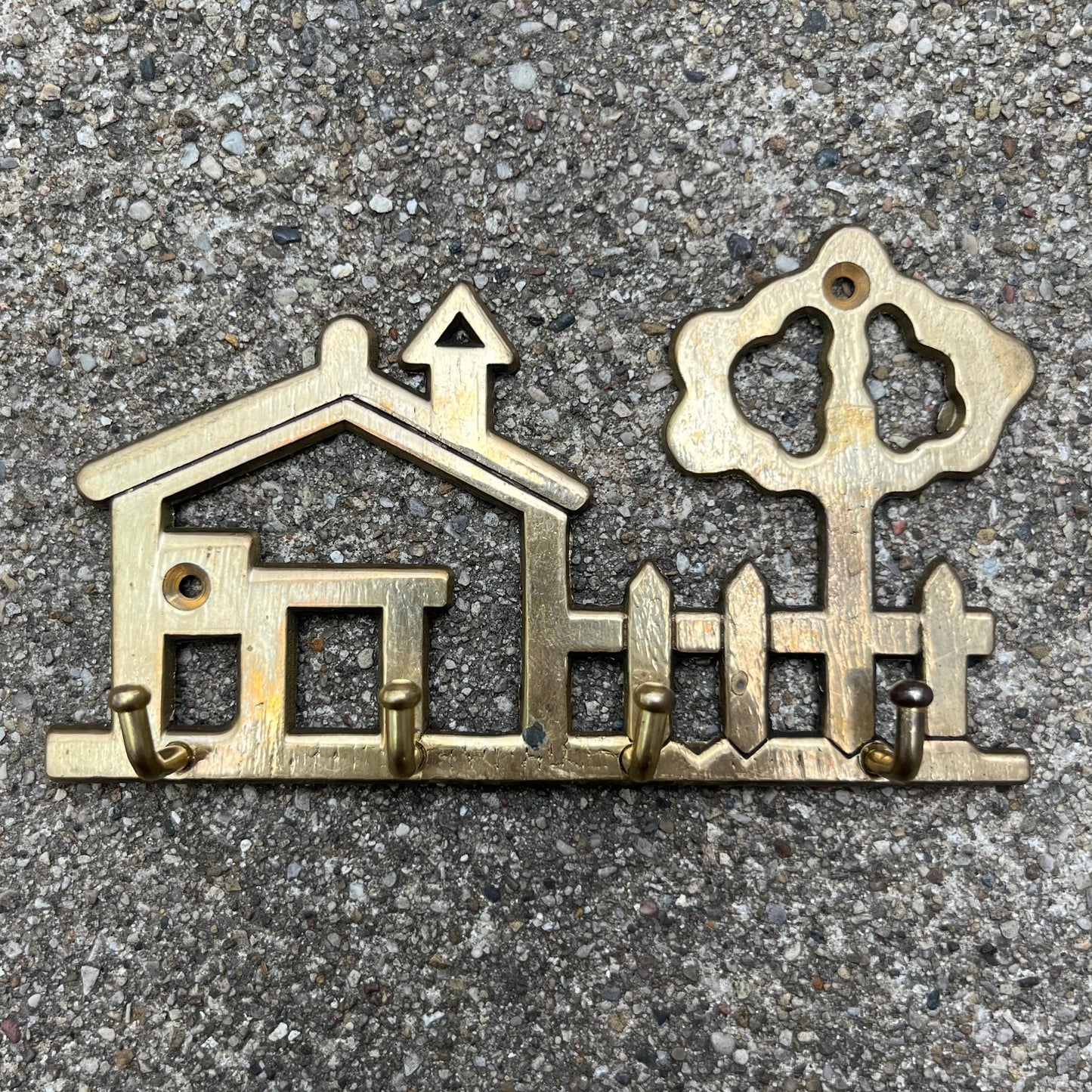 Vintage brass house key holder.
