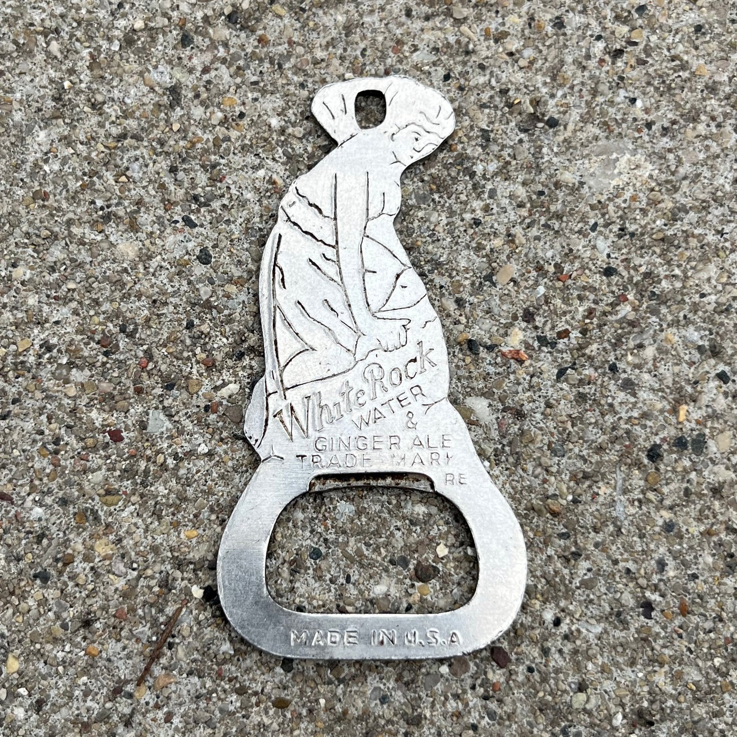 1950s White rock water & ginger ale bottle opener.