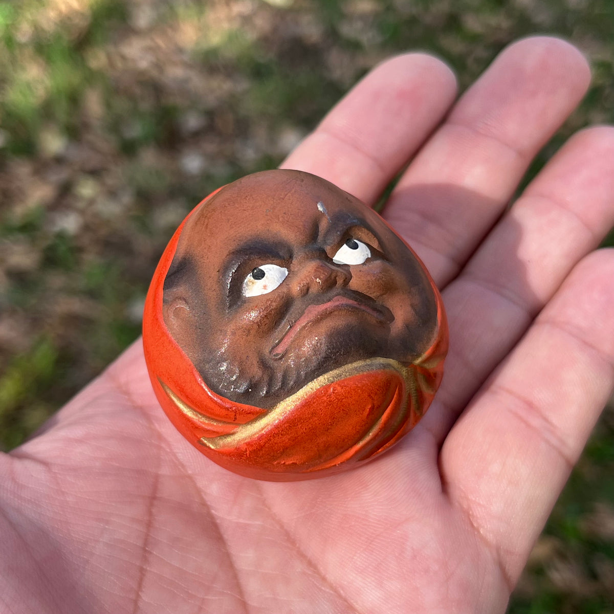 Vintage ceramic Daruma doll.