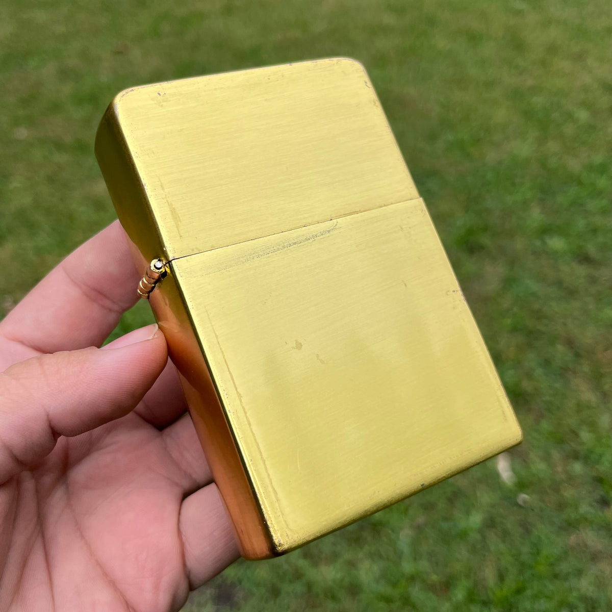 Vintage oversized flip lighter.