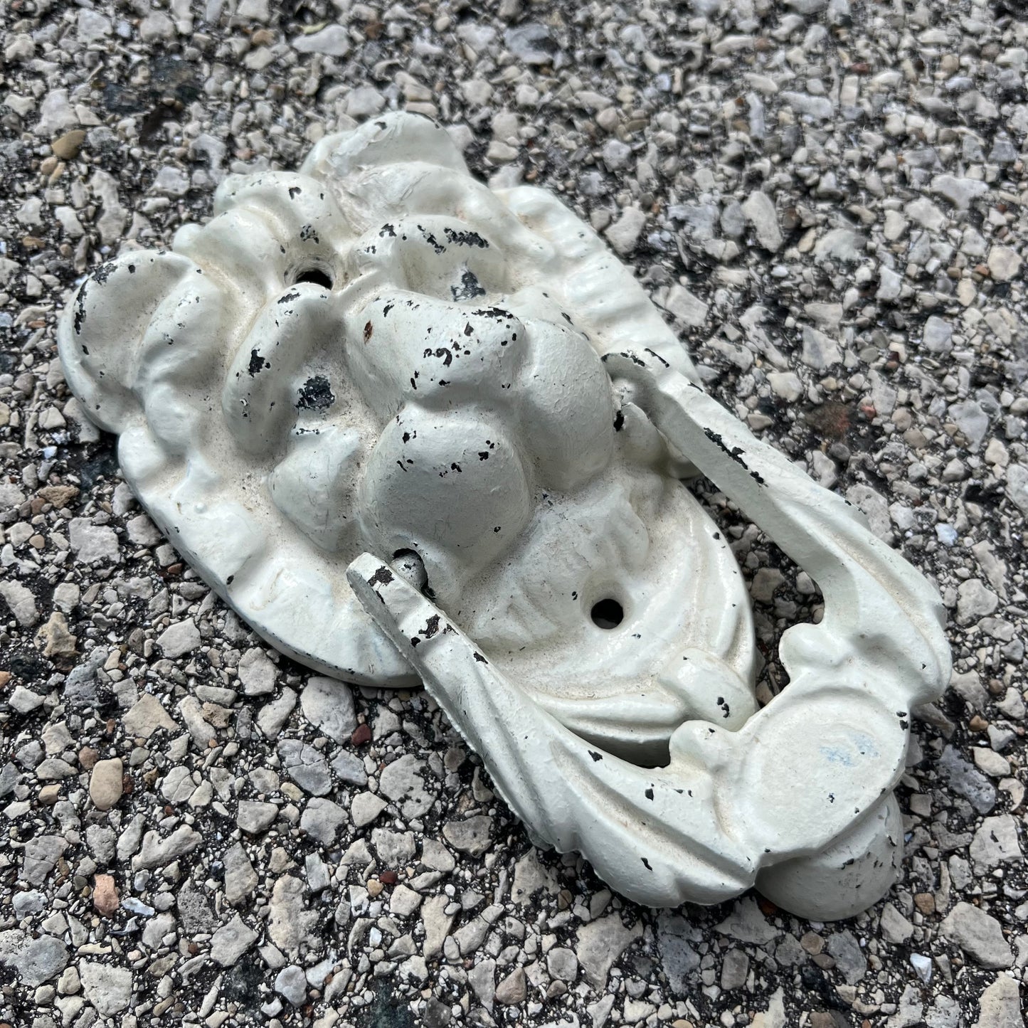 Vintage painted cast iron lion head door knocker.