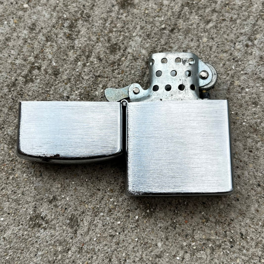 Vintage Supreme flip lighter.
