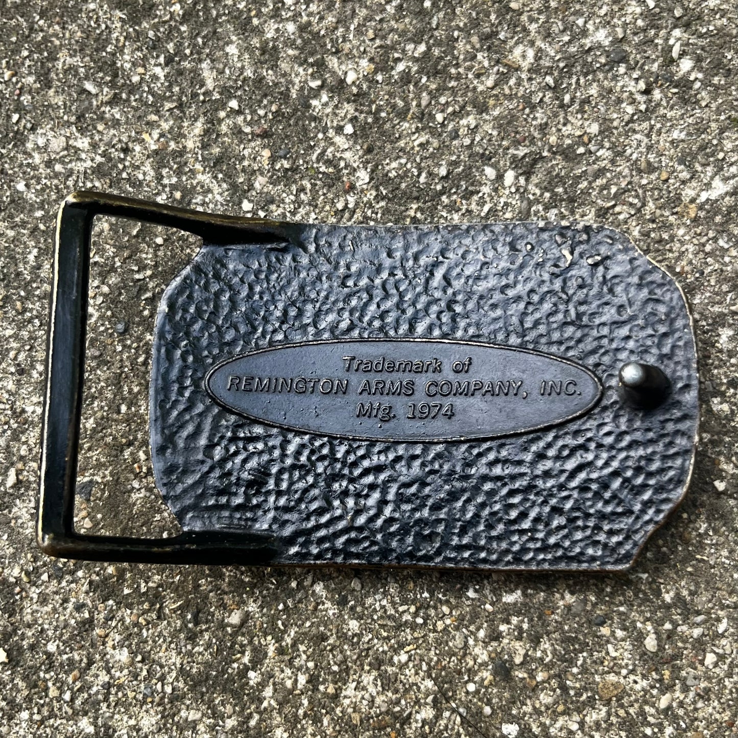 1974 Remington belt buckle.