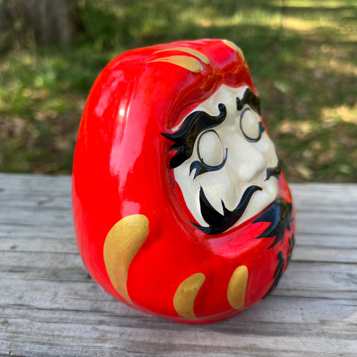 Vintage ceramic Daruma doll.