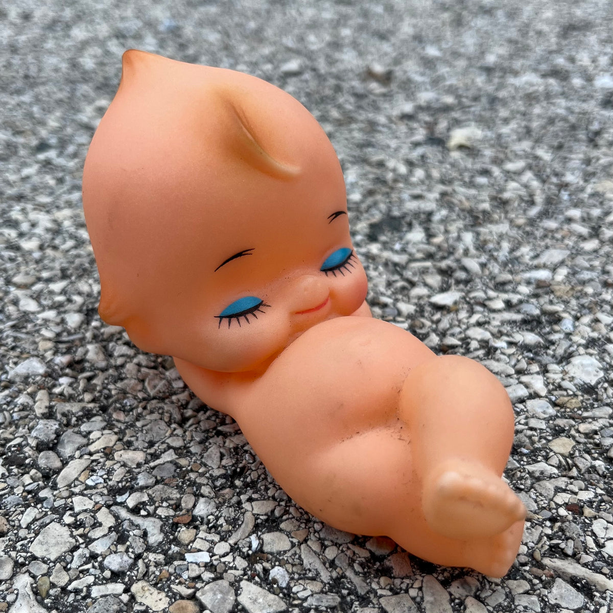 Vintage vinyl sleepy Kewpie.