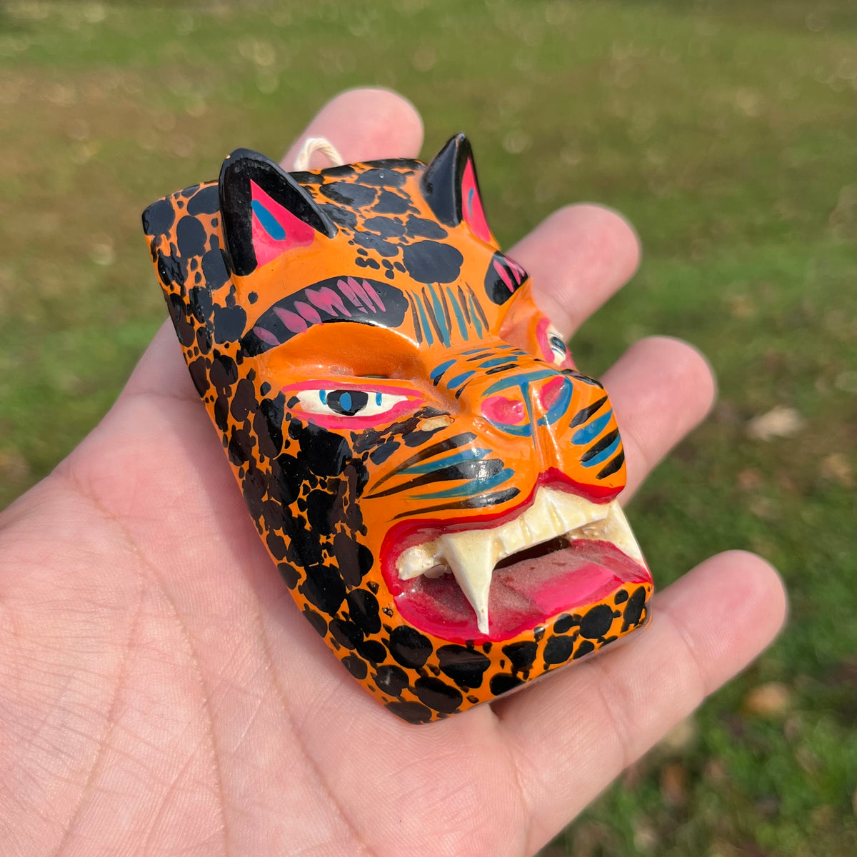 Mini hand crafted Jaguar mask.