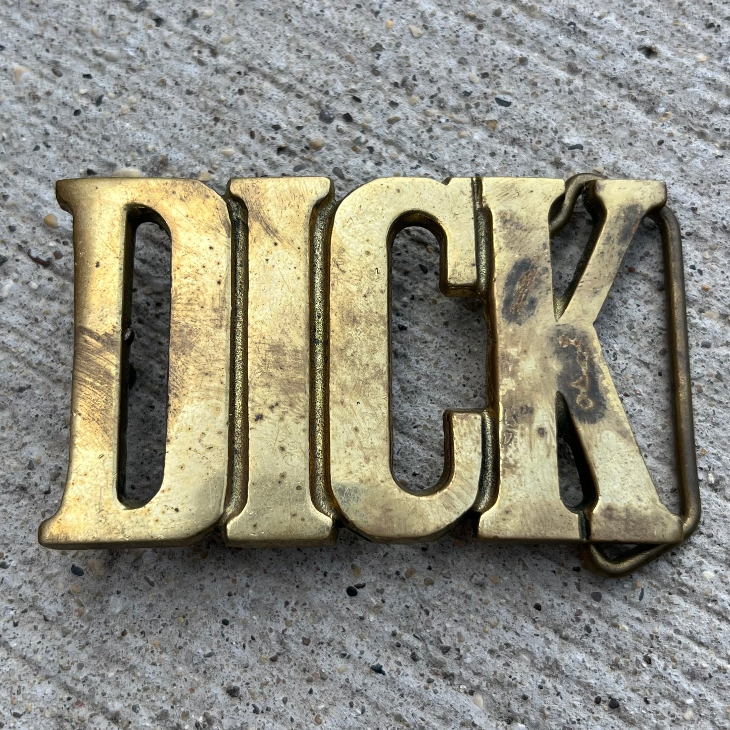 1978 Brass “Dick” belt buckle.