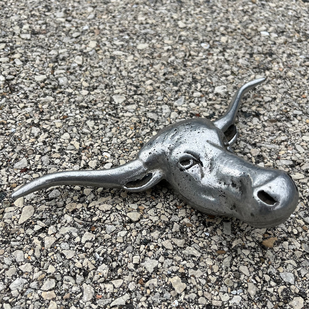 Vintage pewter longhorn hood ornament.