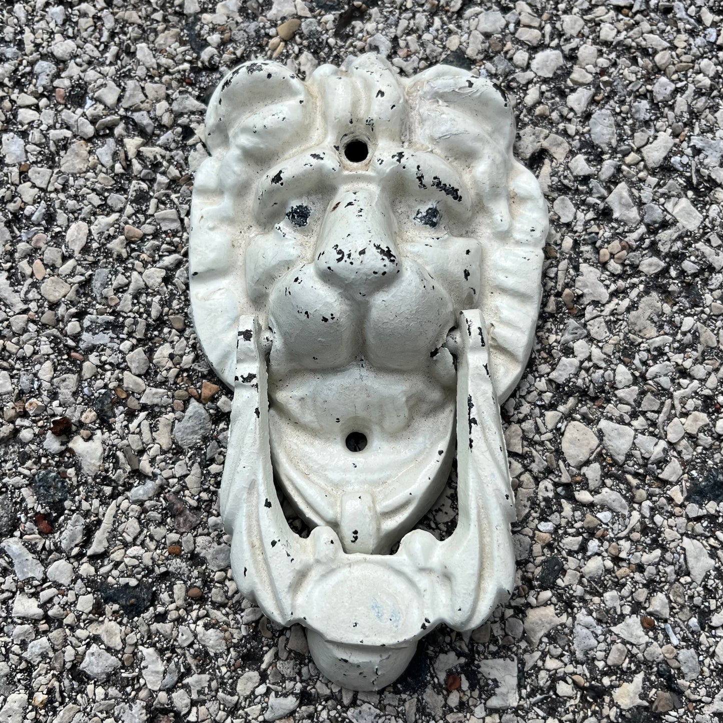 Vintage painted cast iron lion head door knocker.
